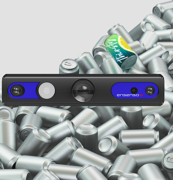 Ensenso's camera sits on a mountain of silver cans, one of which stands out in color.